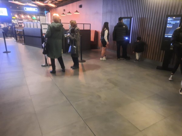 Picture of people standing in the lobby