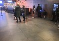 Picture of people standing in the lobby