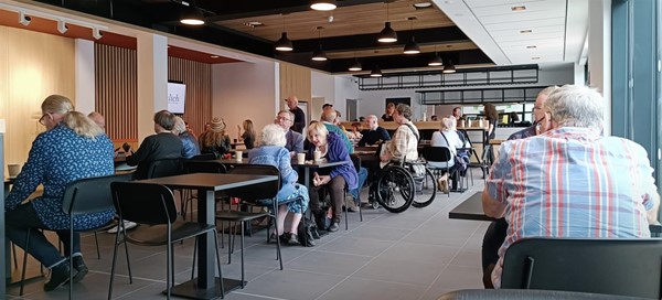 Image of people in a dining area