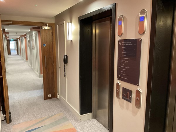 They will point you ahead to the lifts, and you will quickly then arrive at you floor level. Beautifully decorated in pleasing colours, and our accessible room, 108, was not to far from the lift area, but you may need someone with you to open the door from lift into the corridor. The accessible door is nice and wide, so easy for you to be pushed into your room.