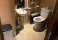 The small accessible toilet.