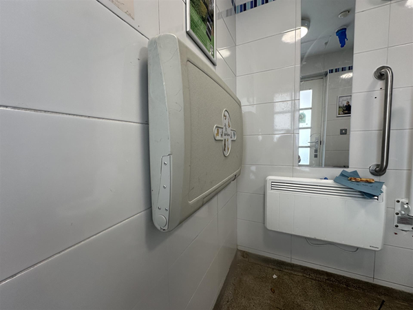 Image of accessible toilet with baby-changing facilities