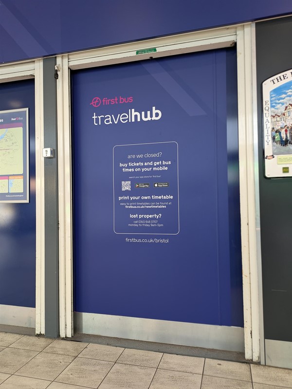 Image of signage advising how to book tickets via mobile