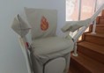Image of a white padded seat