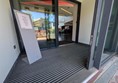 Image of step-free entrance/exit with sliding doors
