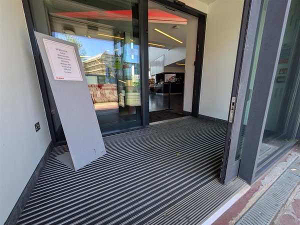 Image of step-free entrance/exit with sliding doors