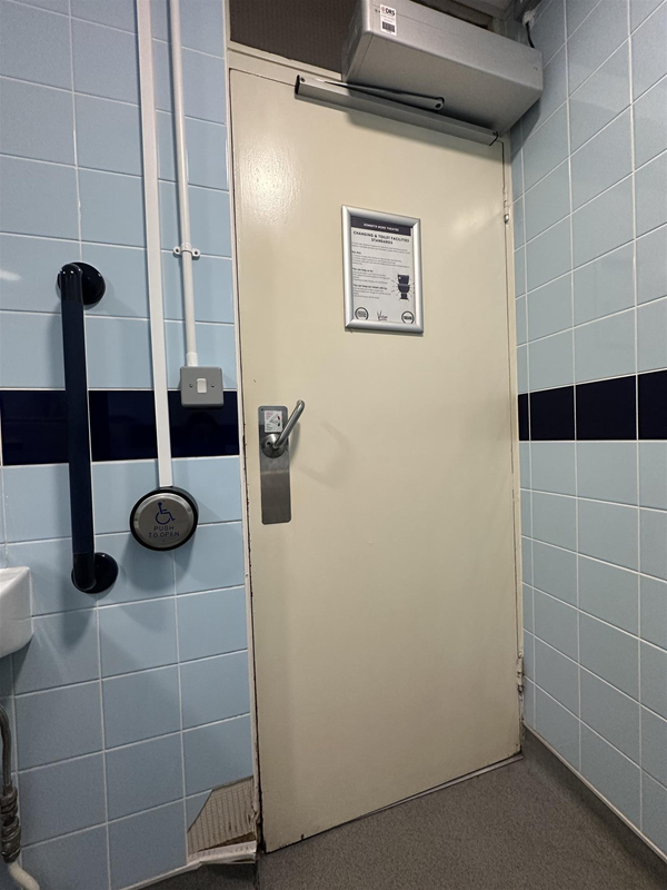 Image of accessible toilet door from the inside