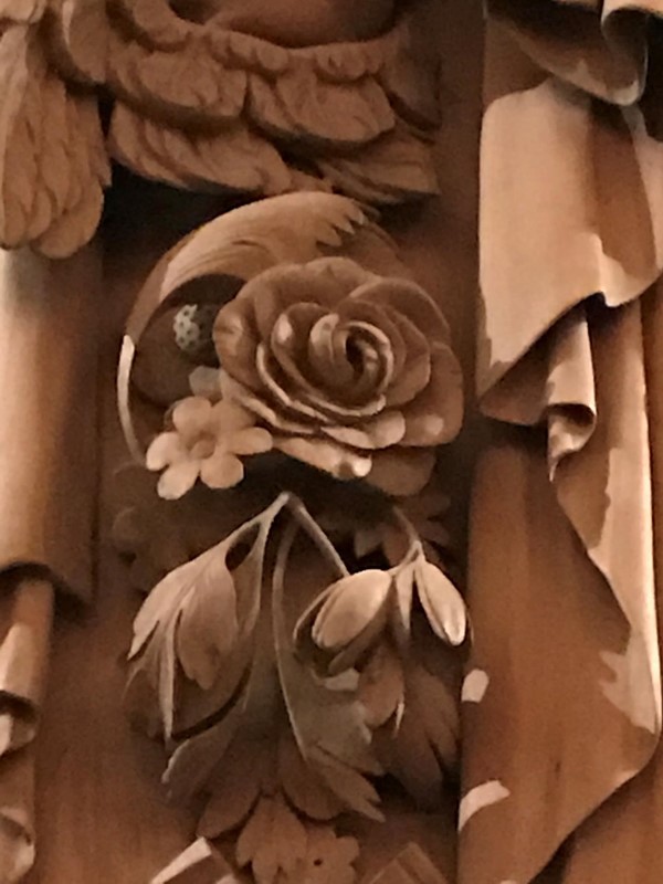 Coughing is above the fireplace