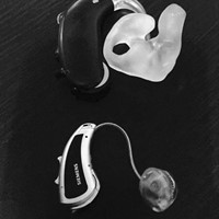 a picture showing the size difference between my hearing aids