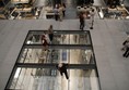 Image of people on a glass floor