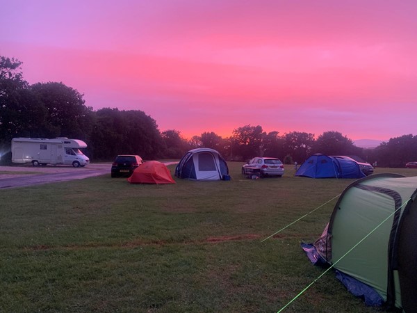 Picture of the campsite with a very red sku