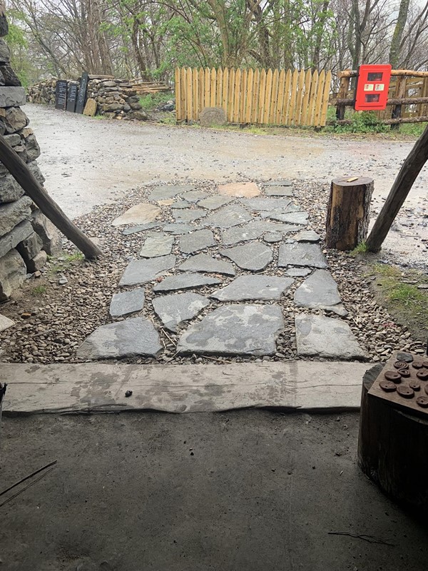 Image of a roughly tiled path