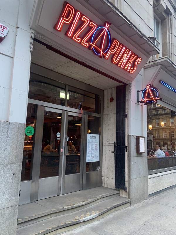 Image of entrance to pizza punks