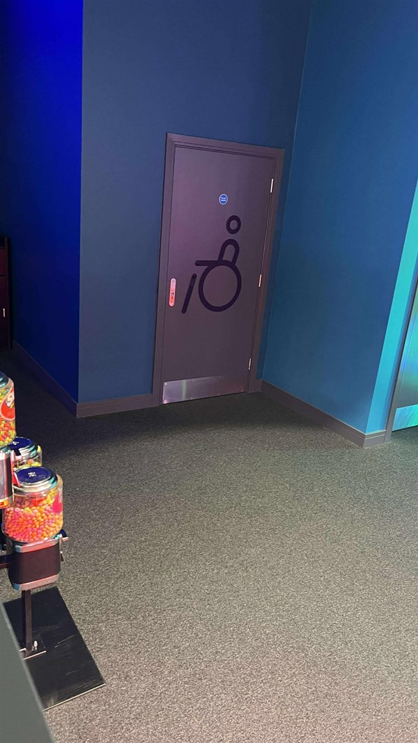 Image of an accessible toilet door