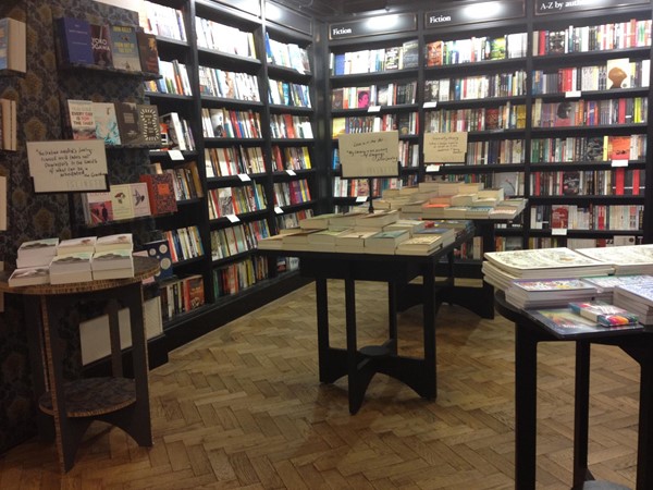 Picture of Waterstones, Islington Green - No room for a wheelchair user to get past these tables into the bay.