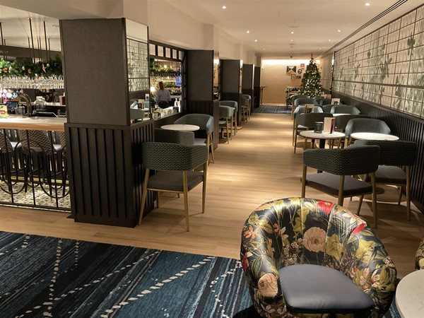 Image of a room with tables andd chairs