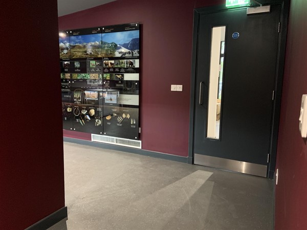 Image of a display and a door