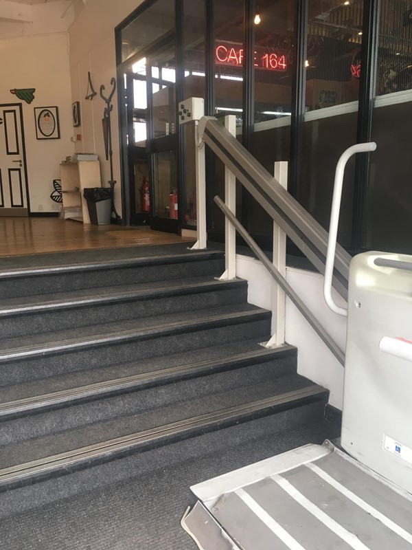 Although the main entrance to the building has steps, the powered stair climber can be used for the wheelchair.