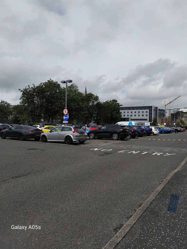 This is the hotel car park which is a one way system the 4 Blue Badge spaces are closet to the hotel and there is a Dropped Kerb  to access the Pavement into the hotel