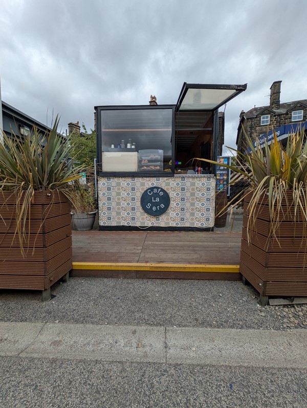 Image of coffee kiosk, elevated on a platform