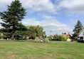 Stone cross in a park