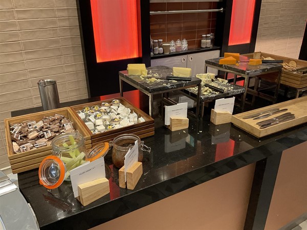 Image of cheese and butter on a buffet counter