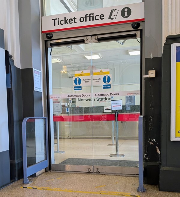 Image of ticket office entrance with automatic doors