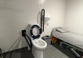 Image of the Changing Places toilet, the toilet is close to a change bed