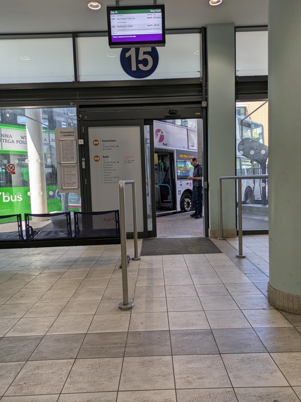 Image of stance 15, overhead signage and automatic doors