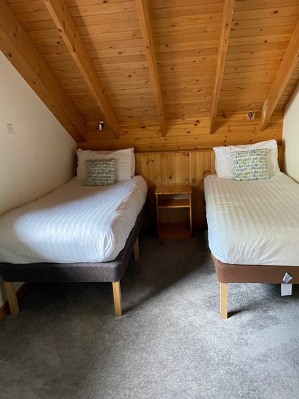 Picture of two beds Upstairs beroom