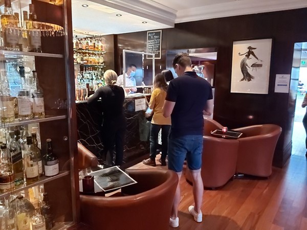 The bar and queue inside.