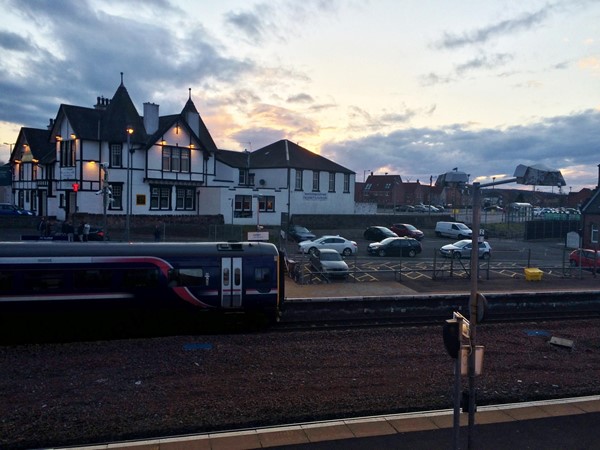 Photo of Larbert Train Station and accessible parking bays.