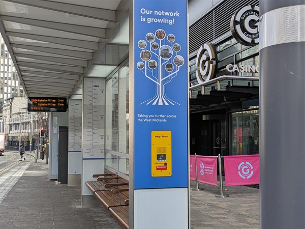 Image of tram platform and emergency button