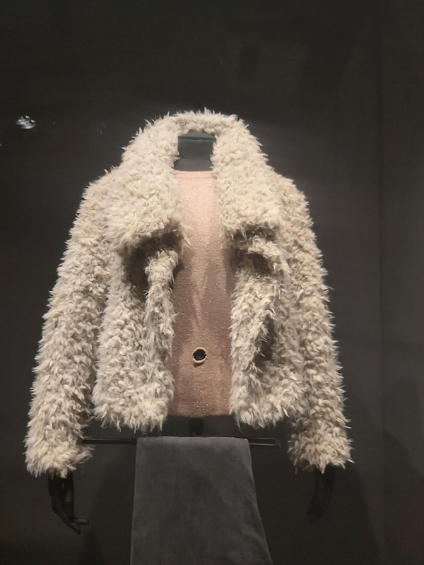 Villanelle's jacket and top with a hole from a stab wound