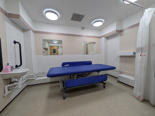 Image of Adjustable change bed in the Changing Places toilet
