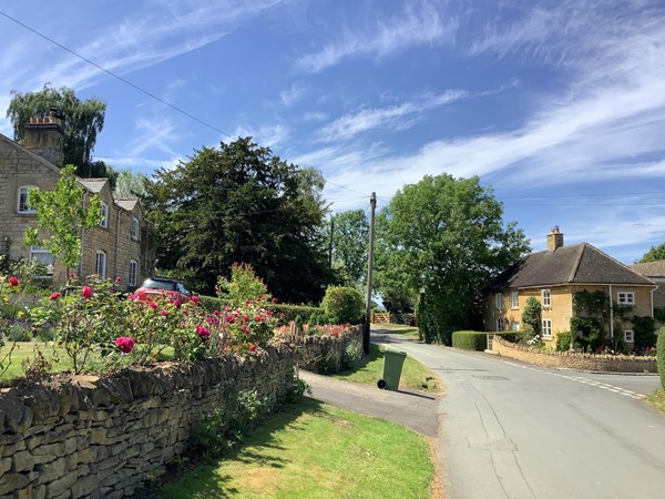 Picture of a road through a village