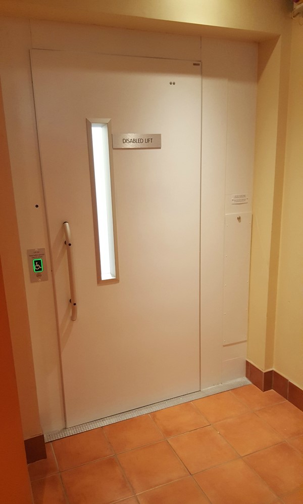 Access to accessible toilet via platform lift