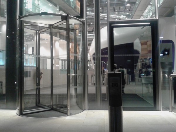 Accessible entrance to the right of revolving door