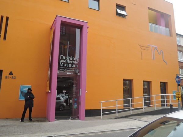 Entrance to the distinctive orange building