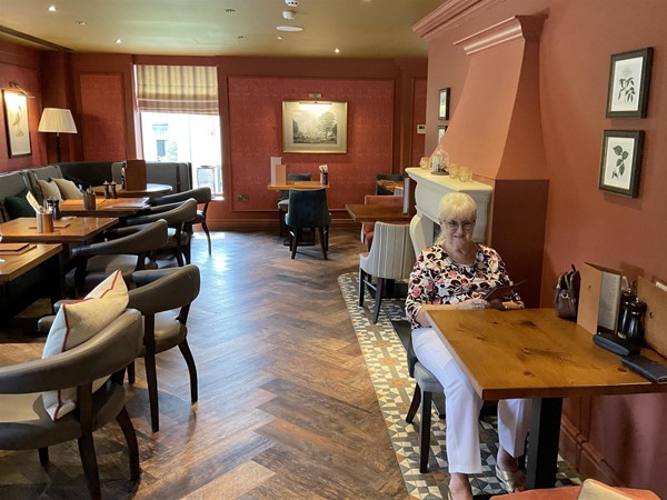 Image of a person at a table