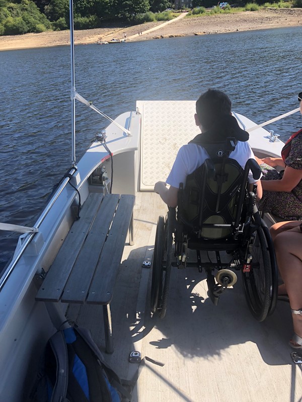 Wheelchair user on a boat