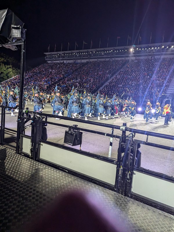 Image of a pipe band on a stage