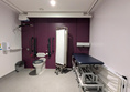 image of toilet and changing bench inside the Changing Places bathroom