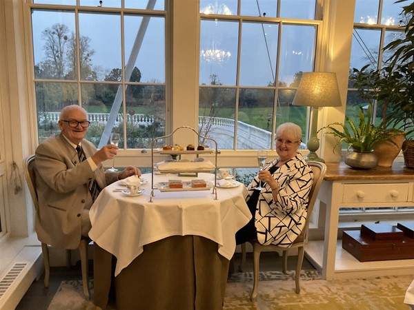 Image of two people sitting at a table