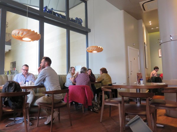 Carluccio's Cambridge interior - accessible toilet door seen in background