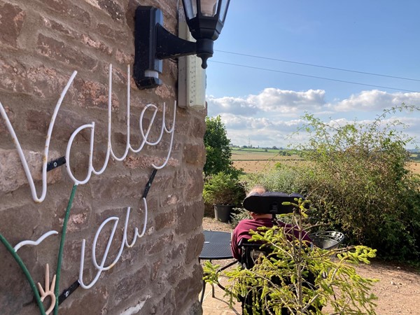 Level patio, which gets the sun in the afternoon and has wonderful views of the valley.
