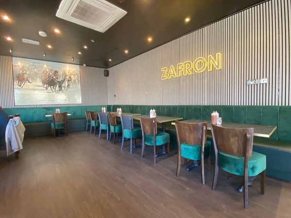 Image of a seating area with tables.