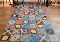 Beautiful floor tiles inside the spacious restaurant