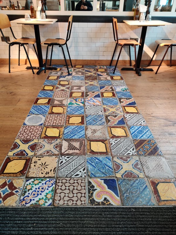 Beautiful floor tiles inside the spacious restaurant