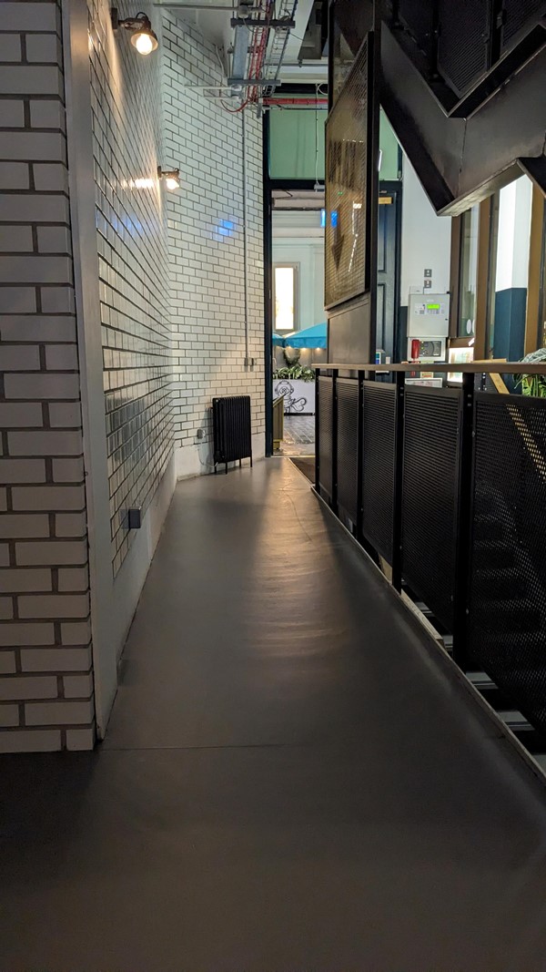 View from the lift to the street - wider than the picture appears although only wide enough for wheelchairs in single file